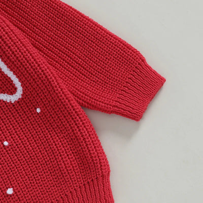 Dziecięcy sweterek bożonarodzeniowy z napisem